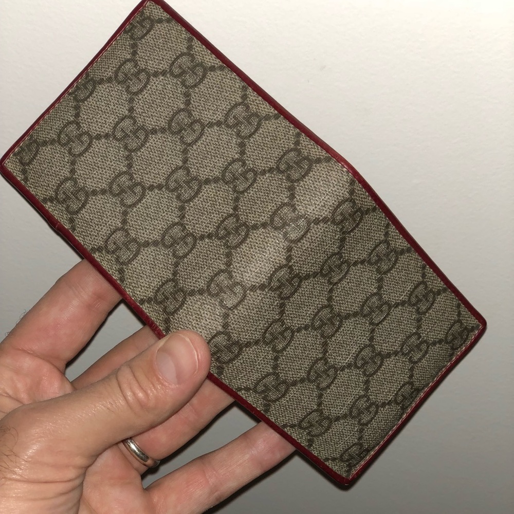 Gucci bi-fold wallet.